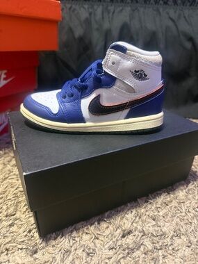 Jordan Kids High-Top Sneakers in White, Blue & Black with Orange Trim